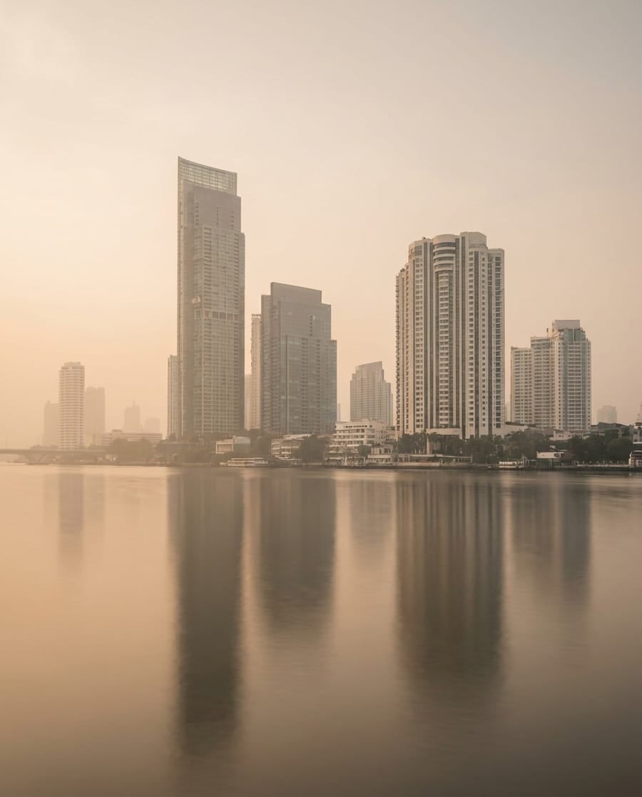Bangkok skyline over the Chao Phraya — dealers, labs and vaults within a few blocks on Silom